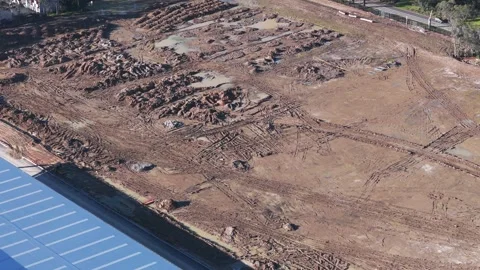 Aerial view of a muddy construction site Stock Footage 341260175
