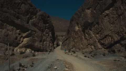 Aerial view of a muddy road in between the mountains in Quetta Pakistan Stock Footage 219860414