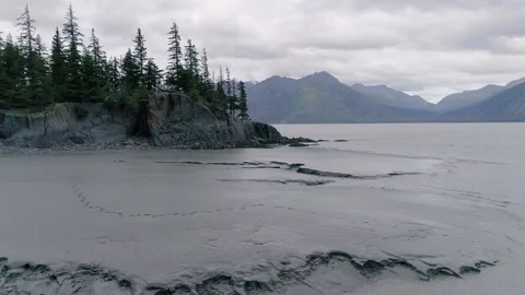 Aerial view of mudflats at low tide on Turnagain Arm near Hope, Alaska. Stock Footage 153376374