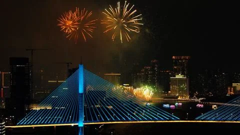 Aerial view multi-colored fireworks sky over night city. Firecracker backgr.. Stock Photos