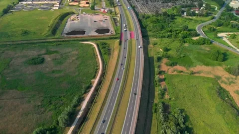 Aerial View of Multi-Lane Highway with Traffic in Rural Landscape Stock-Footage 340040432