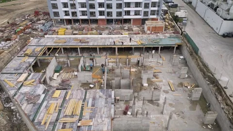 Aerial View of Multi-Stage High-Rise Construction Site Stock-Footage 331536176