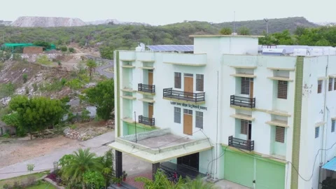 Aerial View of Multi-Storey Student Hostel in Rural Rajasthan Stock Footage 312364810