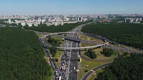 Aerial view of multilane interchange and dense traffic Vidéo 321370357
