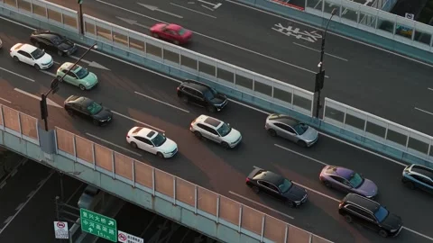 Aerial view of multilevel highway interchange with car and bus traffic in China Stock-Footage 333774380