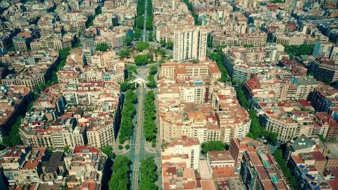 Aerial view of multiple drones flying and filming above Barcelona blocks pattern Stock Illustration