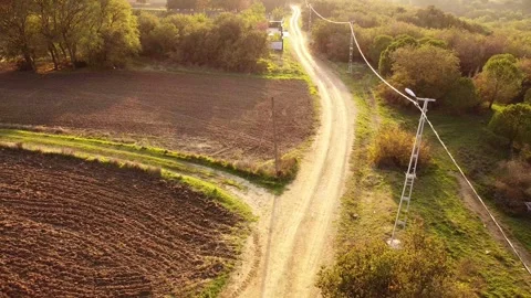 Aerial View of Multiple Roads and Power Pole Under Sunlight Stock Footage 320198405
