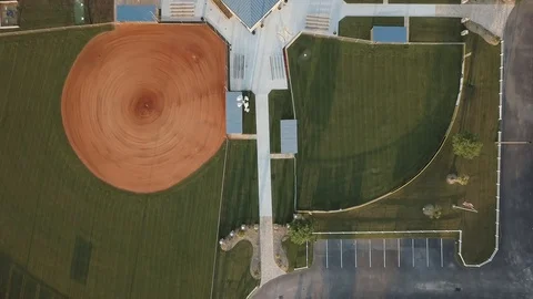 An aerial view of multiple unoccupied baseball fields Stock Footage 128913276