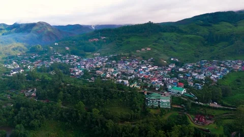 Aerial View of Munnar Town Surrounded by Lush Tea Plantations Stock Footage 341310315