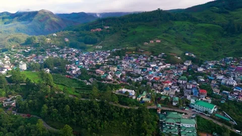 Aerial View of Munnar Town Surrounded by Lush Tea Plantations Stock Footage 341310338