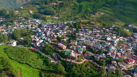Aerial View of Munnar Town Surrounded by Lush Tea Plantations Stock Footage 341310365