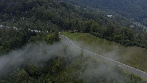 Aerial view muntain road in clouds Stock Footage 118723932