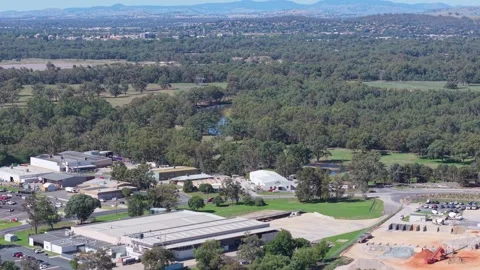 Aerial view of Murray River corridor and Wodonga industrial area Victoria Stock Footage 334927616