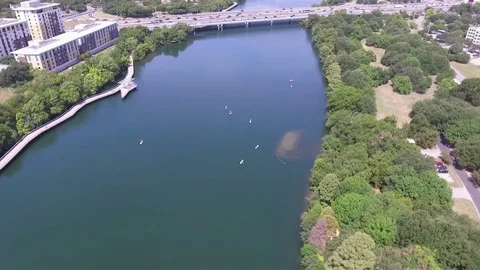 Aerial View of the N Interstate 35 Frontage Rd and the Lady Bird Lake in Stock Footage 94180406