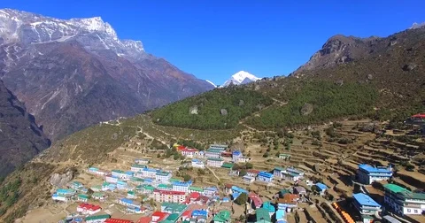 Aerial view of Namche Bazaar in Nepal, and mountains ranges on the background. Stock Footage 70107076