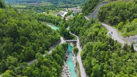 Aerial View Of Napoleon Bridge Over The Emerald Water of Soca Canyon In Stock Footage 336744562