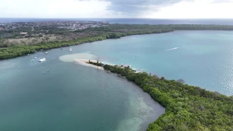 Aerial view of the narrow white sand spit at No Man's Land, Tobago. Crystalline Stock Footage 336360595