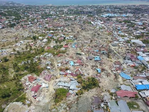 Aerial view of natural disaster aftermath destroying homes and infrastructures Stock Photos