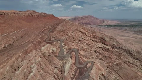Aerial view of Natural Landforms of Flame Mountain in Turpan, Xinjiang China Stock Footage 307495735