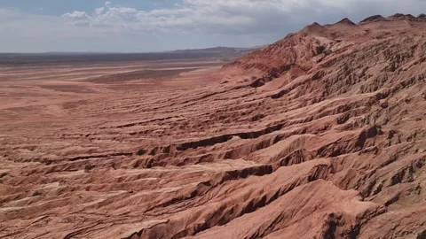 Aerial view of Natural Landforms of Flame Mountain in Turpan, Xinjiang China Stock Footage 307495796