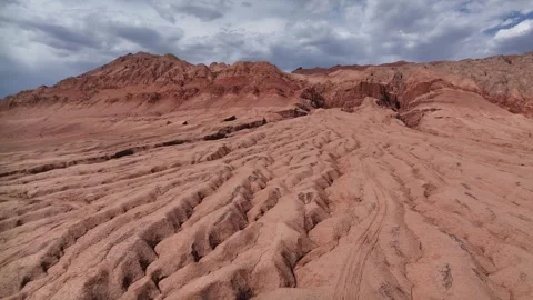 Aerial view of Natural Landforms of Flame Mountain in Turpan, Xinjiang China Stock Footage 307495900
