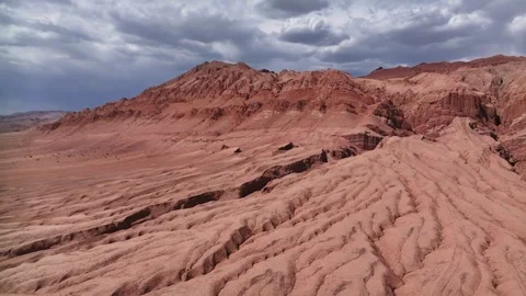 Aerial view of Natural Landforms of Flame Mountain in Turpan, Xinjiang China Stock Footage 307496009