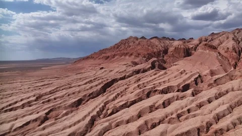 Aerial view of Natural Landforms of Flame Mountain in Turpan, Xinjiang China Stock Footage 307496023