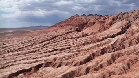 Aerial view of Natural Landforms of Flame Mountain in Turpan, Xinjiang China Stock Footage 307496032