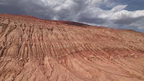 Aerial view of Natural Landforms of Flame Mountain in Turpan, Xinjiang China Stock Footage 307496037