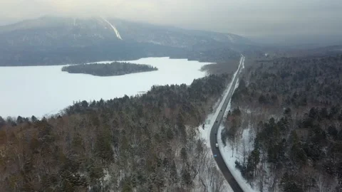 Aerial view of natural landscape of Akan lake Hokkaido Japan in winter season Stock Footage