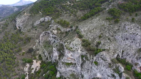 Aerial view of natural rock holes in Els Arcs. Stock Footage 287220249