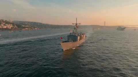 Aerial view of naval ship on Bosphorus at sunset, Turkiye. Stock Footage 340868018