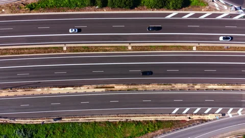 Aerial view of a nearly empty highway with pedestrian, Spain Stock Footage 344693801