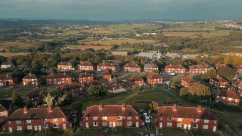 Aerial view of neat rows of red brick homes Stock-Footage 343559049