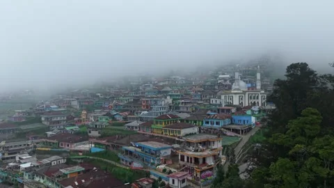 Aerial view of Nepal Van Java village on a misty hillside, Indonesia. Stock-Footage 336320786