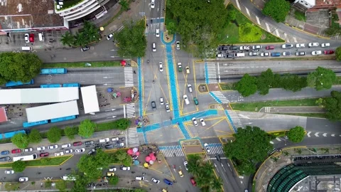 Aerial View of Network of Highways, Road Infrastructure, and Urban Traffic Stock Footage 307974277