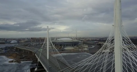 AERIAL VIEW: New cable-stayed bridge and Modern Arena from bird's-eye view Stock Footage 73819304