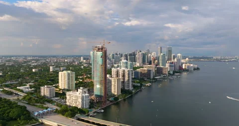 Aerial view of new developing residence in American urban area. Tower crane at Stock Footage 311546885