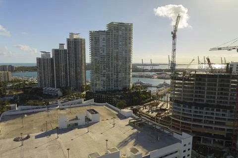 Aerial view of new developing residense in american urban area. Tower cranes at Stock Photos