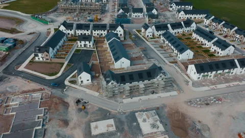 Aerial view of new homes at different stages of construction in Cork 動画素材 342608012