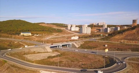 Aerial view of new multi-lever junction with driving cars in Vladivostok, Russia Stock Footage 83330247