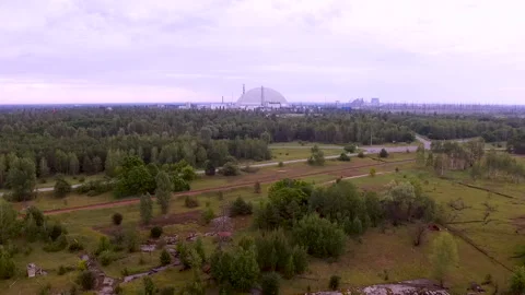 Aerial view of the  New Safe Confinement above the destroyed reactor. Chernobyl Stock Footage 178484249