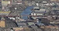 Aerial View of New York City Queens Borough and Industrial Transportation Ship 4k or 4k+ Resolution