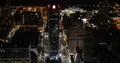 Aerial View of New York City Skyline Midtown Manhattan Streets Illuminated Night 4k or 4k+ Resolution