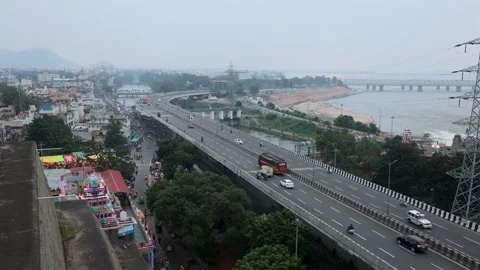 Aerial view of a newly built flyover in Vijayawada city, Time-lapse video. Stock Footage 221714394