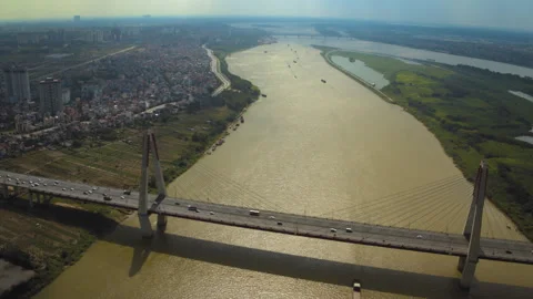 Aerial view of nhat tan bridge crossing red river in hanoi vietnam Stock Footage 329501148