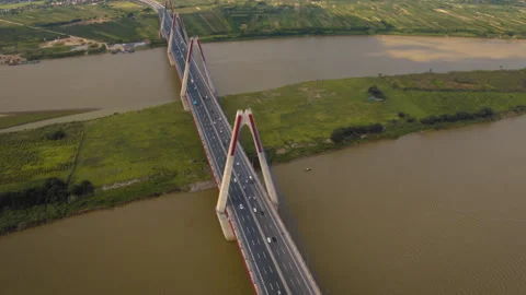 Aerial view of nhat tan bridge with traffic crossing red river in hanoi Stock Footage 329501219