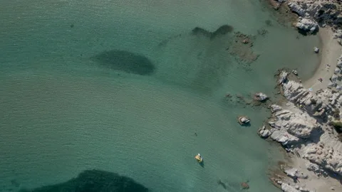 Aerial view of a nice beach in Paros Stock Footage 230232929