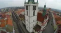 Aerial view of nice old clock on gothic city hall tower, fast motion effect 4k or 4k+ Resolution