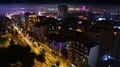 Aerial view of night Batumi city, beautiful illuminated buildings and streets HD Footage